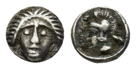 PISIDIA. Selge. Circa 350-300 B.C. AR .(0.35 Gr. 6mm.) 
Gorgoneion facing 
Rev. Head of Athena, wearing crested Attic helmet.