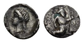 CILICIA. Uncertain. 4th century BC. Tetartemorion (0.2 Gr. 5mm). 
 Female head to left, wearing necklace. 
Rev. The Persian Great King in kneeling-run...