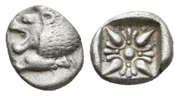 Ionia. Miletos AR Obol. 525-475 BC (1 Gr. 9mm.)
Forepart of lion left. 
Rev. Stellate pattern in incuse square.