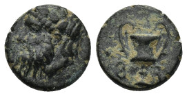 Lydia Uncertain (BC 4th cent) Sardeis? 4th century BC. AE (1.8 Gr. 12mm). 
Head of Dionysios left, wearing ivy wreath 
Rev. Kantharos; F and S (in Lyd...