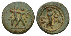 PISIDIA. Etenna. AE (1st century BC). (2.2 Gr. 14mm.)
Two men standing side by side; the left brandishing double-axe, the right sickle. 
Rev: ET - EN....