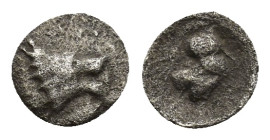 PAMPHYLIA, Side. 2nd-1st century BC. AR (0.15 Gr. 6mm.) 
Head of Athena right, wearing crested Corinthian helm 
Rev. Head of roaring lion right.