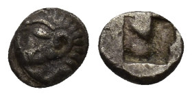 Ionia, Kolophon Circa 530-500 BC AR Tetartemorion. (0.46 Gr. 7mm.) 
Archaic head of Apollo left 
Rev. Irregular incuse square punch.