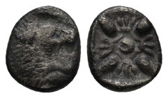 IONIA. Miletos. Diobol 6th-5th century BC. (1.1 Gr 9mm.)
 Forepart of lion right, head right.
 Rev. Stellate pattern within incuse square.