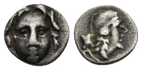 Pisidia. Selge circa 350-300 BC. Obol AR (0.85 Gr. 9mm.) 
Gorgoneion
Rev. Head of Athena to right, wearing crested Attic helmet; behind, astragalos.