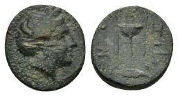 Mysia. Kyzikos circa 350-300 BC. AE. (1.3 Gr. 11mm.). 
Head of Kore Soteira right, hair bound in sakkos 
Rev. KY-ZI, tripod, monogram to right, below,...