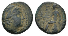 SELEUKID KINGS OF SYRIA. Antiochos II Theos, 261-246 BC. AE (2.2 Gr. 13mm), Antiochia on the Orontes. Laureate head of Apollo to right. 
Rev. Apollo s...