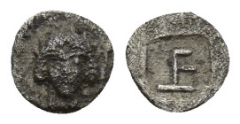 IONIA. Kolophon. Circa 500-450 BC. Tetartemorion (0.20 Gr. 6mm.). 
Female head 
Rev. Monogram of TE (mark of value) within incuse square.