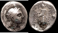 Demetrios I. Soter. (162-150 BC) AR Drachm. (20mm, 3,67g) Antioch. Obv: head to the right. Rev: sitting Apollo Delphios left on omphalos.