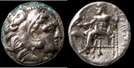 Alexander the great (336-323 BC) AR Drachm Subaeratus. (15mm, 2,50g) Obv: head of Alexander the great right. Rev: sitting Zeus holding eagle and scept...