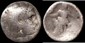 Alexander the Great. (336-323 BC) AR Drachm. (16mm, 3,77g) Obv: head of Alexander the great right. Rev: sitting Zeus holding eagle and scepter.