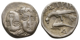 MOESIA, Istros (4th century BC.) AR Drachm.
Obv: Facing male heads, the left inverted.
Rev: ΙΣΤΡΙΗ.
Sea-eagle left, grasping dolphin with talons; m...