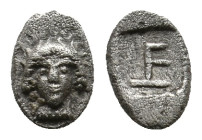 IONIA. Kolophon. (Circa 450-410 BC). AR Tetartemorion.
Obv: Facing head of Apollo.
Rev: TE monogram (mark of value) in incuse square.
Milne, Coloph...