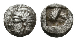 IONIA. Kolophon (Late 6th century BC.) AR Hemiobol.
Obv: Archaic head of Apollo left.
Rev: Quadripartite incuse square.
SNG Kayhan I 342.
Conditio...
