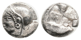 Ionia, Phokaia. AR archaic obol Ca. 510-494 B.C. Helmeted female head left, hair in sakkos,
wearing rosette-earing / Four-part incuse square.
1.14 g 4...