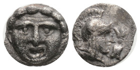 PISIDIA. Selge. Obol (Circa 350-300 BC). 0,94 g. 6 mm.
Obv: Facing gorgoneion.
Rev: Helmeted head of Athena right;