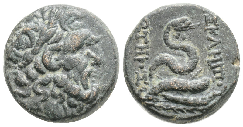 Mysia, Pergamon. AE, 8,7 g 19 mm. Circa 133-27 BC.
Obv: Laureate head of Asklepi...
