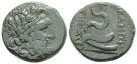 Mysia, Pergamon. AE, 7,3 g 21 mm. Circa 133-27 BC.
Obv: Laureate head of Asklepios to right.
Rev. AΣKΛHΠIOΣ – ΣΩTHPOΣ, Serpent coiled around omphalos....