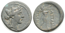 Phrygia, Apameia, c. 88-40 BC. Æ Uncertain magistrate. Turreted bust of Artemis–Tyche r., bow and quiver over shoulder.
R/ Marsyas advancing r., playi...
