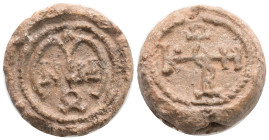 Byzantine Lead Seal ( 7-8 th centuries) 18,1 g. 22,2 mm.
Obv: Cruciform monogram
Rev: Cruciform monogram