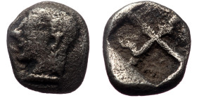 Ionia, Uncertain (ca 500 BC) AR Obol (bronze, 9mm, 0.75g). 
Obv: Archaic head (of Apollo?) left 
Rev: Quadripartite incuse square. 
Ref: SNG Tübingen ...