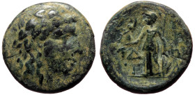 Aiolis, Temnos (2nd-1st centuries BC) AE (Bronze, 17mm, 3.34g) 
Obv: Wreathed head of Dionysos right 
Rev: Δ-H / T-A, Athena Nikephoros standing left,...