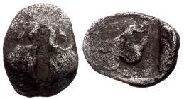 Caria, Uncertain AR Tetartemorion *Silver, 020g, 8mm) ca 5th century BC
Obv: Confronted heads of two bulls
Rev: Forepart of bull left within incuse sq...