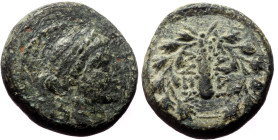 Lydia, Sardes,AE, (Bronze,3.89 g 14 mm), 2nd-1st centuries BC. 
Obv: Laureate head of Apollo, right.
Rev: ΣAPΔIA / NΩN, Club right within wreath.
Ref:...