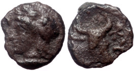 Mysia, Kyzikos, AR Hemiobol, (Silver, 0.31 g 7 mm) ca 410-400 BC.
Obv: Head of Attis left, wearing Phrygian cap; below, tunny left.
Rev: [KYZI], Head ...