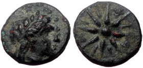 Mysia, Gambrion, AE (Bronze, 0.92 g 10 mm), 4th century BC. 
Obv: Laureate head of Apollo to right. 
Rev: [ΓAM], Star. 
Ref: SNG France 926.