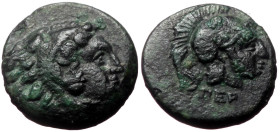 Mysia, Pergamon, AE, (Bronze,0.96 g 10 mm), Circa 300-250 BC. 
Obv: Head of young Herakles right, wearing lion skin.
Rev: ΠΕΡ, Helmeted head of Athena...