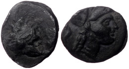Asia Minor,Uncertain, AE, (Bronze, 0.52 g 9 mm), Circa 3rd century BC.
Obv: Helmeted head of Athena right. 
Rev:Uncertain figure.