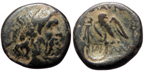 Ueaserched Greek AE coin (Bronze, 6.39g, 28mm), with countermark
Obv: Laureate Zeus bust right
Rev: Eagle standing left, head right, flanked by two ke...
