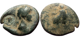 Unreaserched Roman Provincial AE coin (Bronze, 2.31g, 18mm), with countermark
Obv: Head right, countermark "Men's (?) head right within round incuse" ...