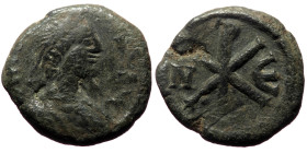 Justin I (518 - 527) AE Pentanummium (Bronze, 2.23g, 14mm) Nicomedia.
Obv: Diademed, draped and cuirassed bust right.
Rev: N-E, Christogramm between m...