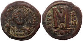 Justinian I (527-565) AE Follis (Bronze, 21.85g, 38mm) Constantinople, dated RY 14 (540/1 AD). 
Obv: D N IVSTINIANVS P P AVG, diademed, helmeted, and ...