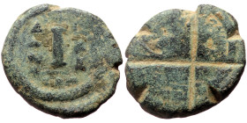 Justinian I (527-565) AE Decanummium (Bronze, 4.16g, 18mm) year 30 (556-567)
Obv: X letter (mark of value?) engraved over hardly visible: D N IVSTINI ...