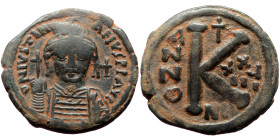 Justinian I (527-565) AE Half Follis (Bronze, 26mm, 7.88g). Nicomedia, Dated RY 29 (555/6). 
Obv: Helmeted and cuirassed bust facing, holding globus c...