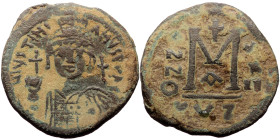 Justinian I (527-565) AE Follis (Bronze, 35mm, 19.10g) Cyzicus, 1st officina. Dated RY 23 (AD 549/50). 
Obv: Helmeted and cuirassed facing bust, holdi...