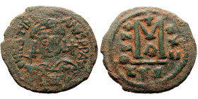 Justinian I (527-565) AE Follis (Bronze, 38mm, 19.39g) Cyzicus 1st officina, Dated RY 22 (AD 548/9). 
Obv: Helmeted and cuirassed facing bust, holding...