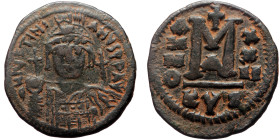 Justinian I (527-565) AE Follis (Bronze, 31mm, 19.82g) Cyzicus 1st officina, Dated RY 22 (AD 548/9). 
Obv: Helmeted and cuirassed facing bust, holding...