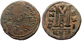 Justinian I (527-565) AE Follis (Bronze, 35mm, 19.31g) Cyzicus 2nd officina, Dated RY 21 (AD 547/8). 
Obv: Helmeted and cuirassed facing bust, holding...