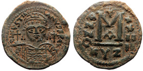 Justinian I (527-565) AE Follis (Bronze, 35mm, 17.43g) Cyzicus, 1st officina. Dated RY 24 (AD 550/51). 
Obv: Helmeted and cuirassed facing bust, holdi...