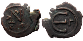 Justin II (565 - 578) AE Pentanummium (Bronze, 1.60g, 17mm) Constantinople 
Obv: Monogram of Justin.
Rev: Large E with cross at cetner, Γ on right.
Re...