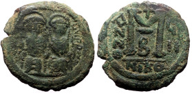 Justin II and Sophia, AE, Follis. (Bronze, 12.24 g. 29 mm.) Nicomedia. 565-578 AD.
Obv: [DN IVSTI]NVS PP [AVG], Justin II and Sophia nimbate and seate...