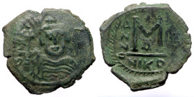 Tiberius II Constantine (578-582) AE Follis (Bronze, 9.52g, 30mm) Nikomedia, 
Obv: Grabled legend, Crowned, mantled bust facing, holding mappa and eag...