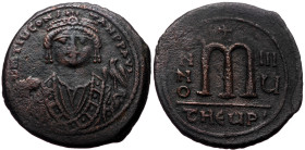 Tiberius II Constantine, AE, Follis. (Bronze, 12.58 g. 31 mm.) Theopolis (Antioch). 578-582 AD.
Obv: D m Tib CONSTANT P P AVI, Crowned and cuirassed b...