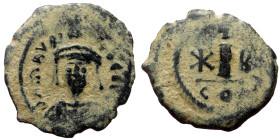 Maurice Tiberius (582-602) AE Decanummium (Bronze, 2.56g, 20mm) Constantinople.
Obv: Crowned, draped and cuirassed bust facing.
Rev: Large I; cross ab...
