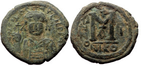Maurice Tiberius (?), AE, Follis (Bronze, 12.34 g. 30 mm.) Nicomedia. 582-602 AD.
Obv: [DN] TIb[ER m]AVR[C PP AVI], crowned, cuirassed bust facing, ho...