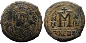 Maurice Tiberius (582-602) AE Follis (Bronze, 27mm, 11.77g) Antioch, Year 13=A.D. 594/5. 
Obv: DN MAVΓI CN P AUT, crowned bust facing, wearing consula...